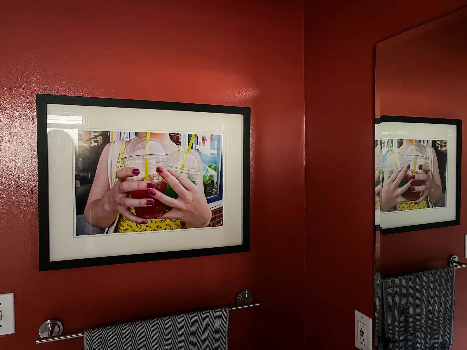 red bathroom with photograph